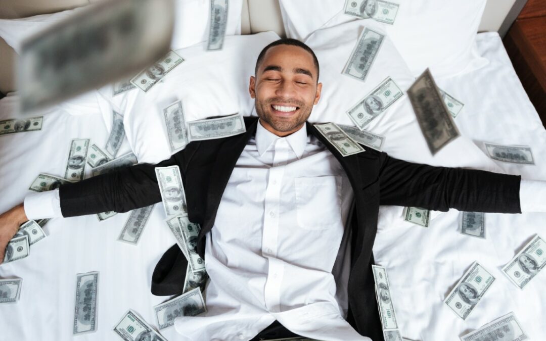 happy man surrounded by money